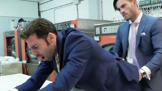 Rich gays in suits fuck in the laundry room