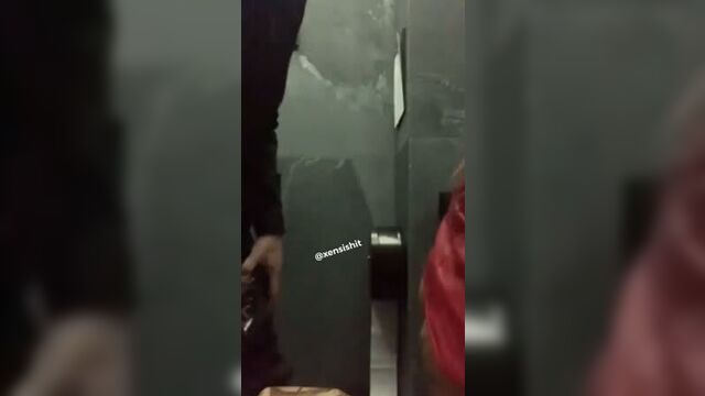 A girl from Moscow sucks dick in the toilet of a nightclub after a corporate party, blowjob, on the cheek, Russian homemade porn on the phone