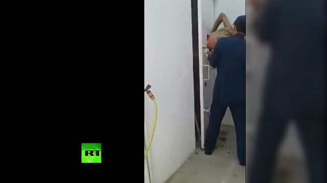 Thief stuck in door