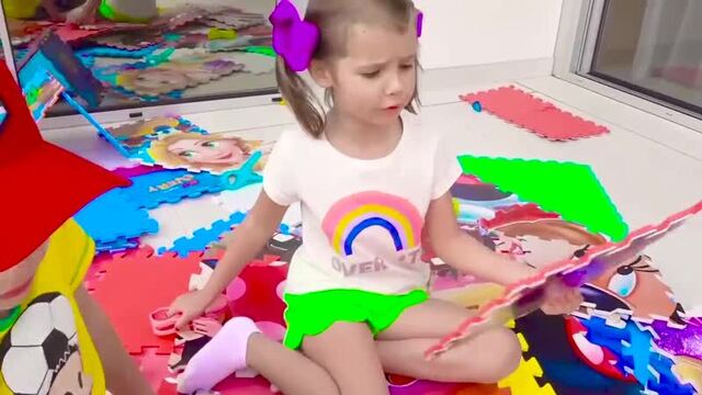 Max and Katya play with children's houses