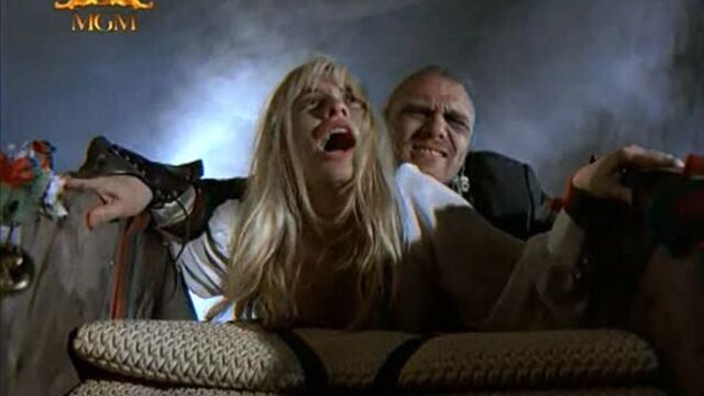 sexual violence and BDSM (rape, rape, bondage) from the film: Roller Blade Warriors - 1989