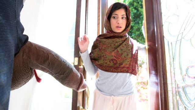 A bitch in a hijab fucks with a black man