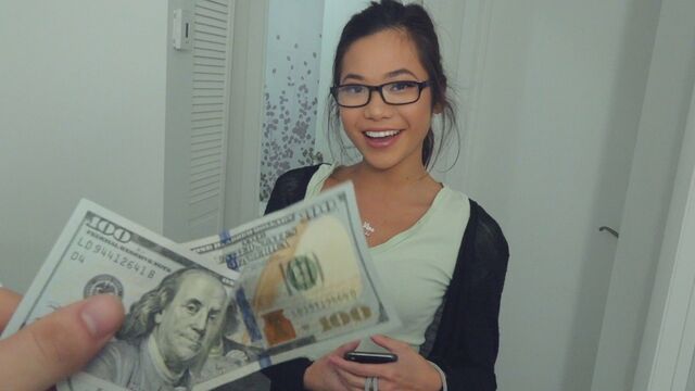 Cute Asian girl with glasses sold her shaved pussy for 200 bucks