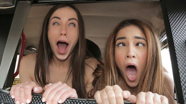 Two naughty young Latinas please a taxi driver in the back seat of his car