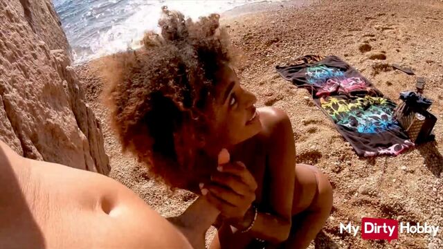 Gorgeous black chick Luna Corazon sucks big white dick on the beach
