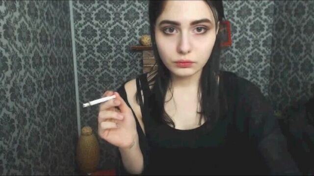 Sexy girl smokes