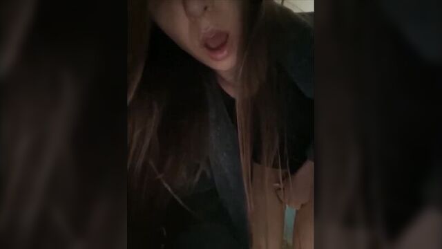 A girl fucks herself with a toy in the entrance 18+