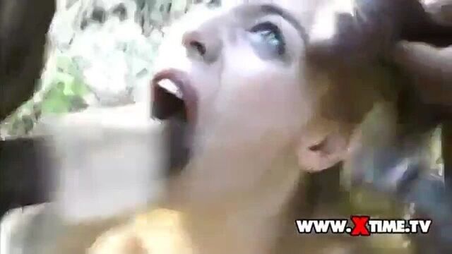 A goth girl brought a modest blonde to her black friends so that they could fuck her in a crowd