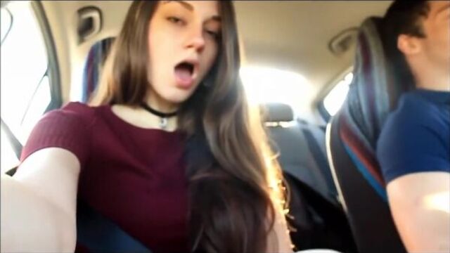 Beautiful girl sucks driver while he is driving