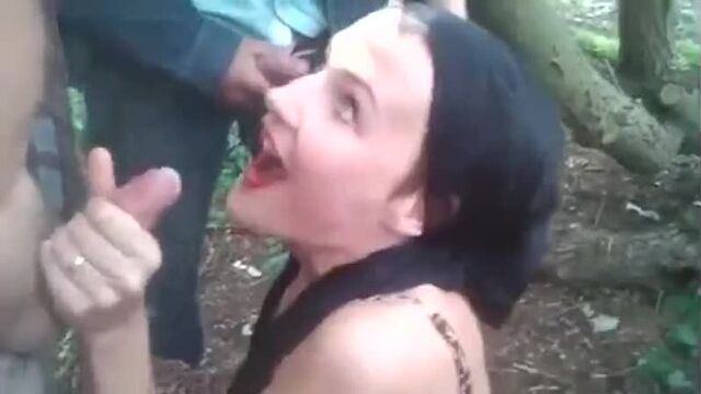 Blowjob the crowd in the forest.
