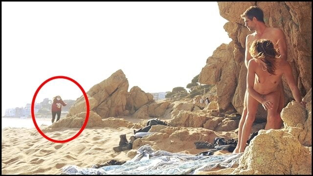 Couple caught having sex on the beach