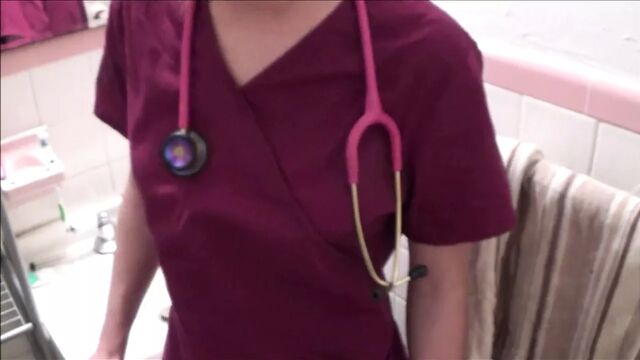 Young nurse mother examining stepson - family therapy