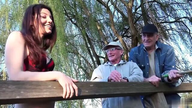 Two old men fuck a beautiful girl while fishing