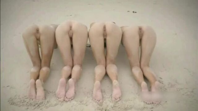 4 naked beauties revealed themselves in all their glory on the beach