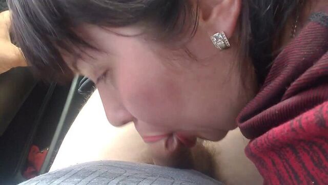 A mature slut from Ukraine gives a blowjob to a young guy in the car, cumming into his mouth. Real sex private homemade amateur