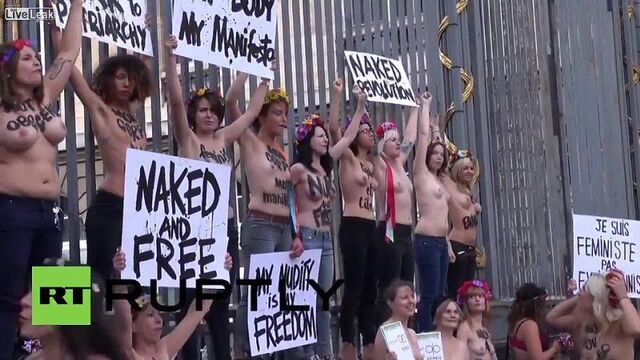 Naked girls from Femen against the cops