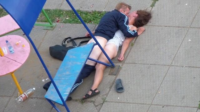 Drunk weirdos play pranks under the windows of a high-rise building