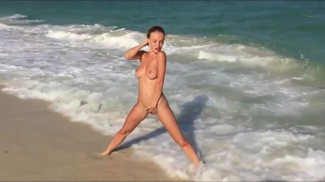 Naked nude model Natalya Andreeva on a nudist beach