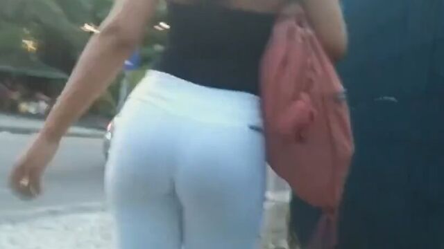 Hidden camera follows a beautiful black ass down the street